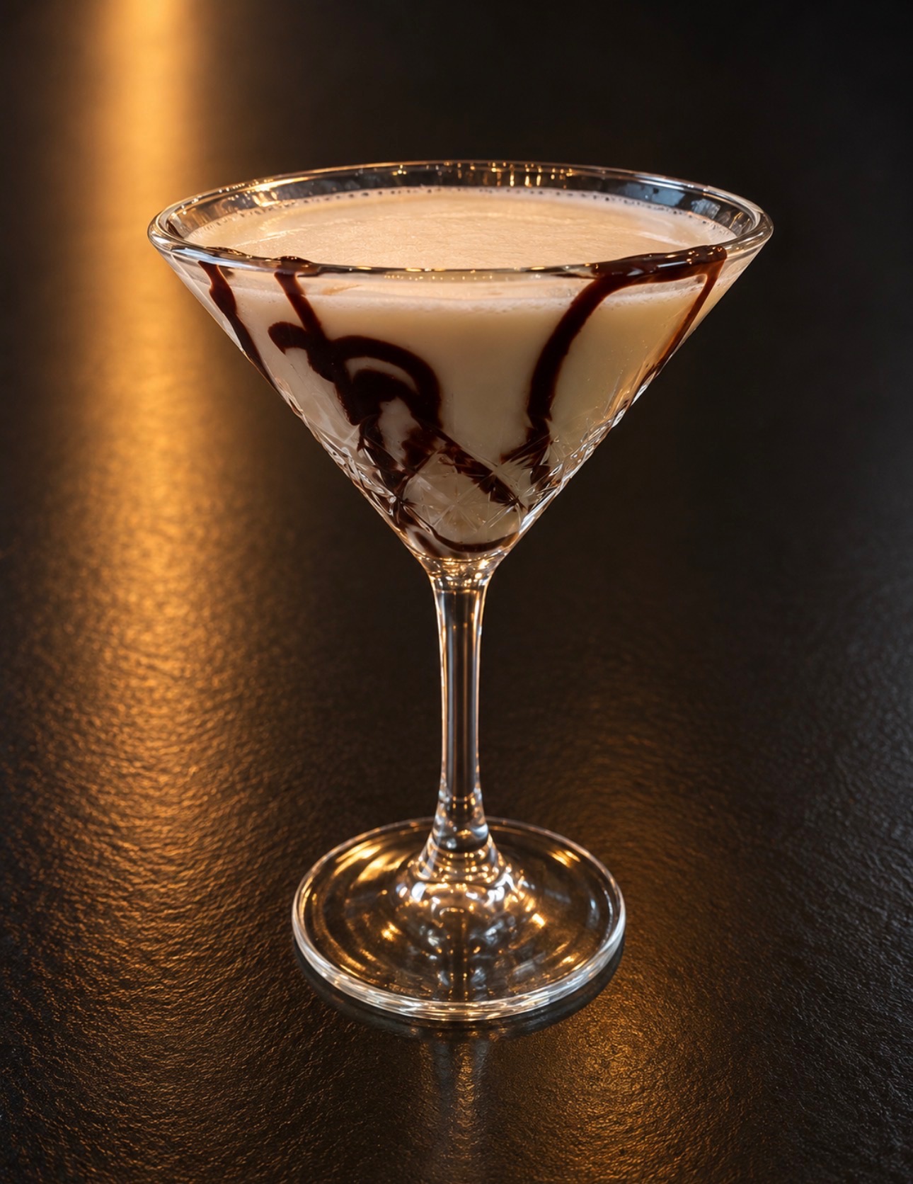 Peanut Butter Cup martini with chocolate drizzle at Oak and Iron